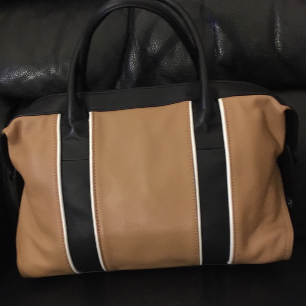 Woman’s leather handbag by L..A.M.B.